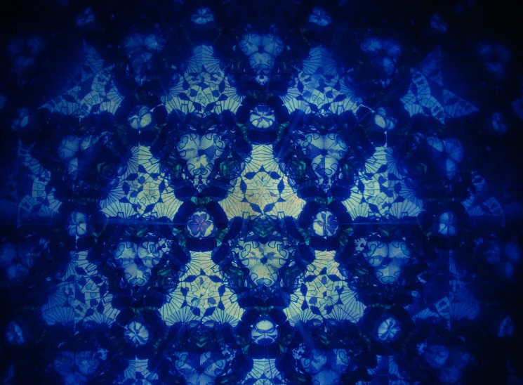 a blue patterned picture with different patterns