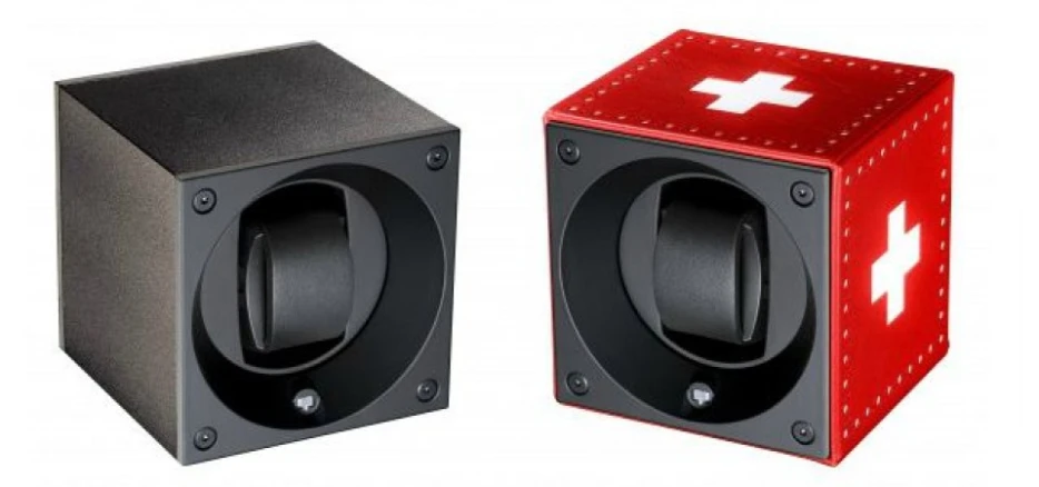 pair of red and black speakers in wooden boxes