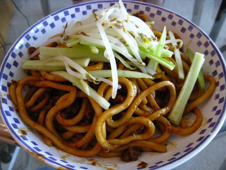 a close - up po of an asian noodle dish