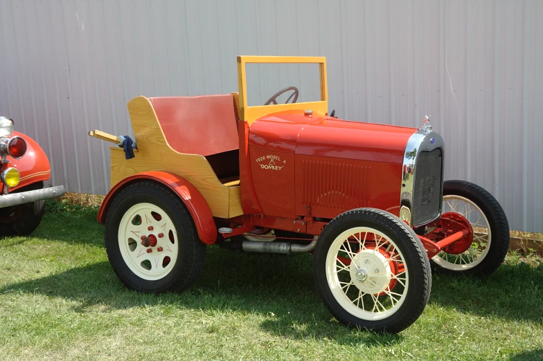 a close up of an old fashion style tractor