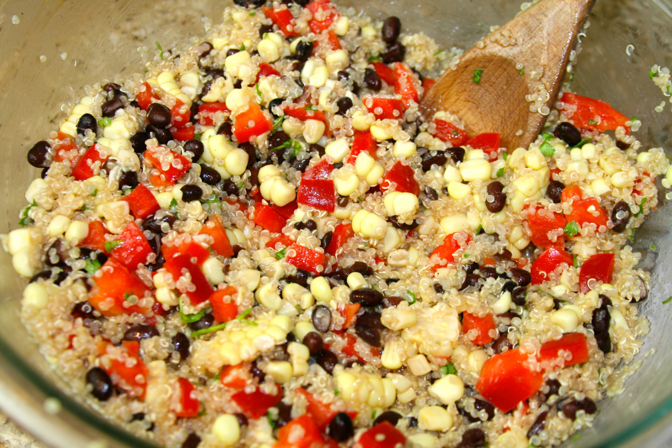 vegetables, rice, and grains mixed in a bowl