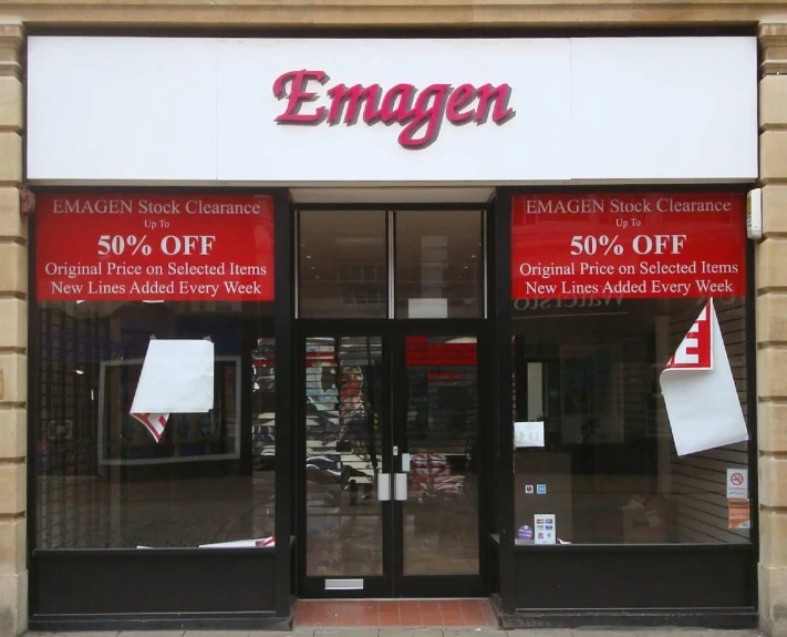 this is an empty grocery storefront with its doors open