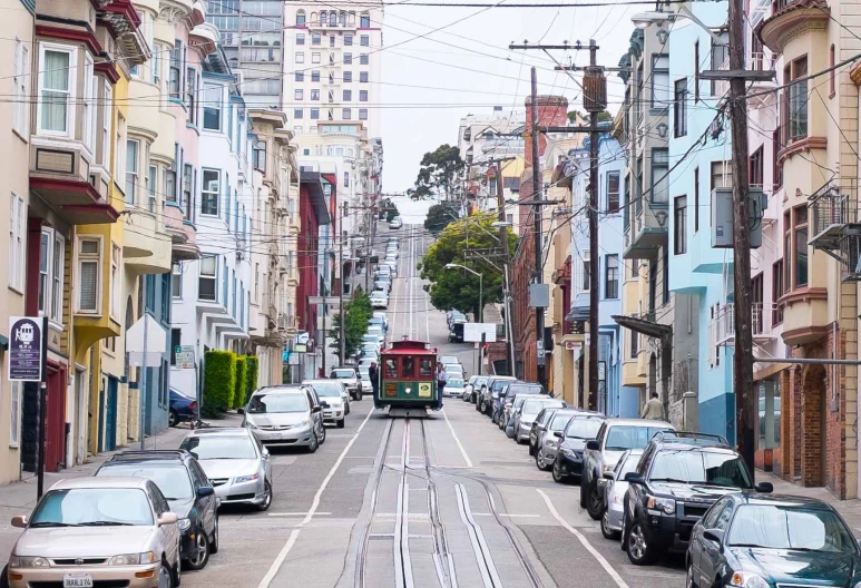 a trolley going down the middle of the road