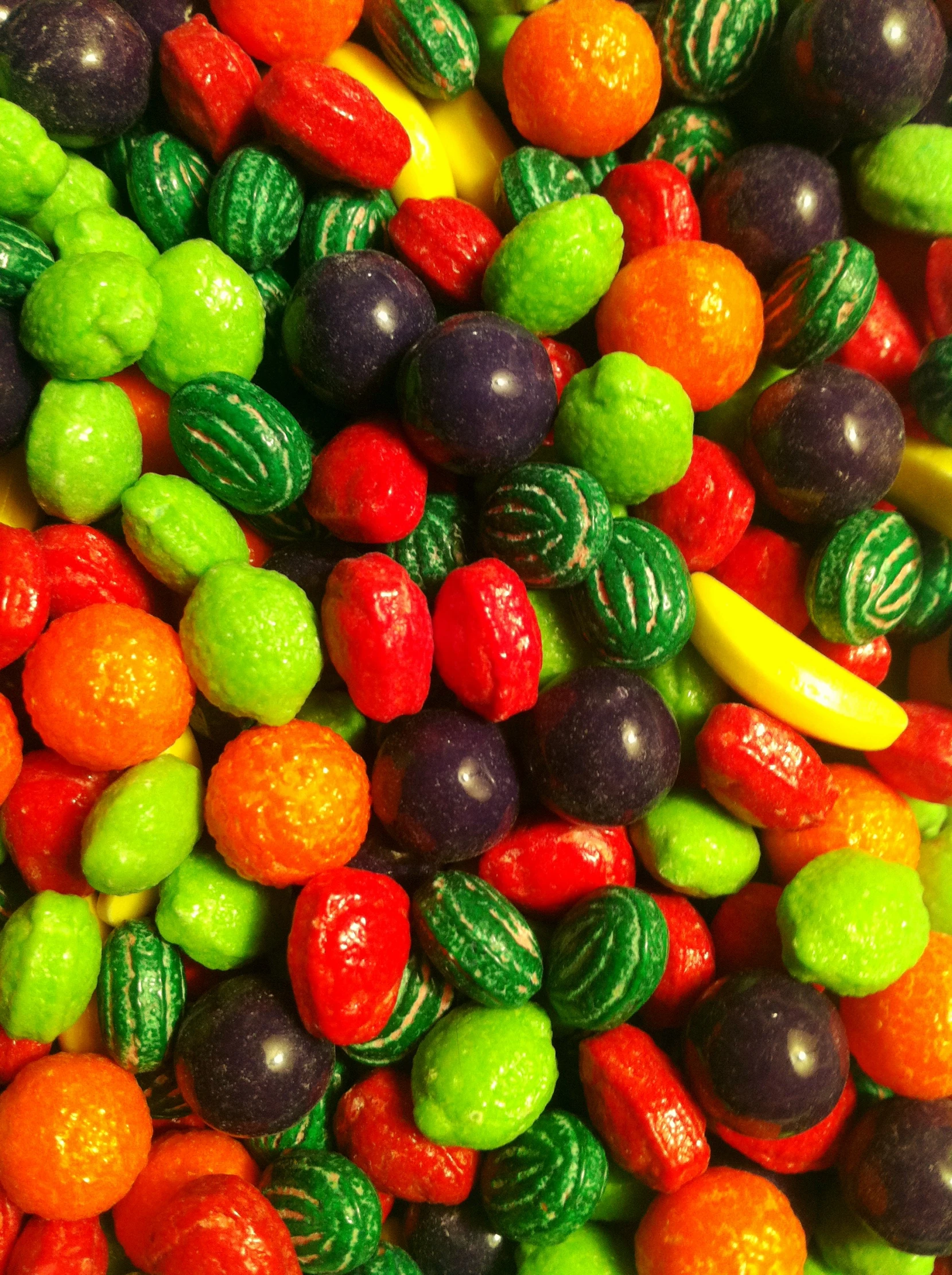 a close up view of many colorful fruits