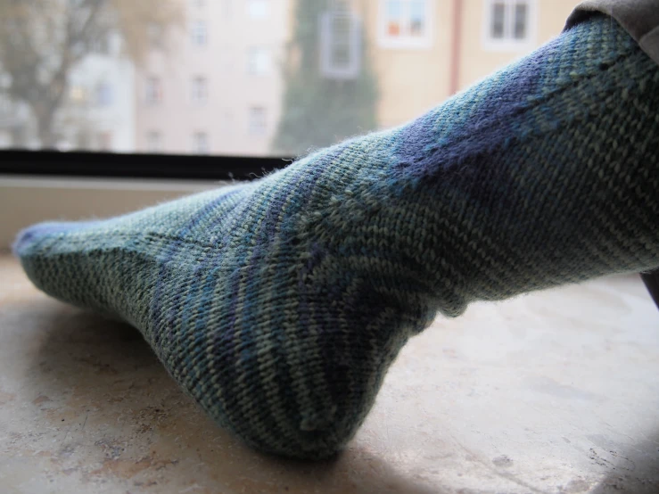 a person's socks with the socks visible