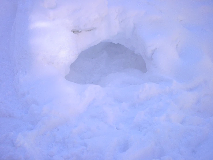 snow with a bird's eye view from inside the hole