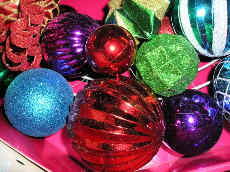 a close up of a bunch of christmas balls