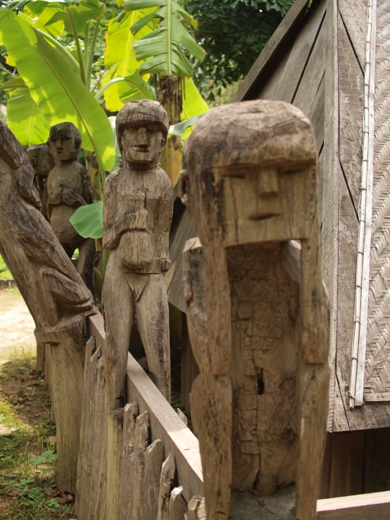 an image of some sculptures in front of a building