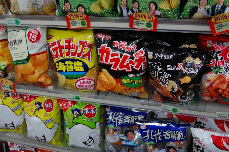 there are some snacks for sale in a grocery store