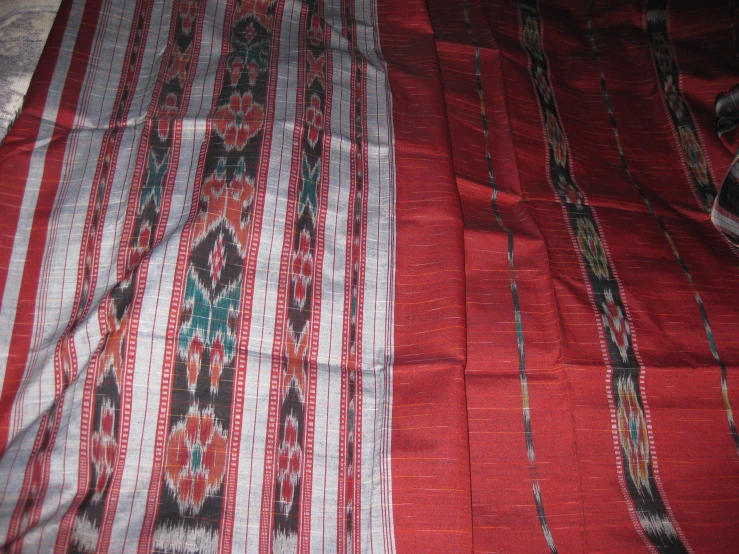two woven pieces of cloth laying on each other