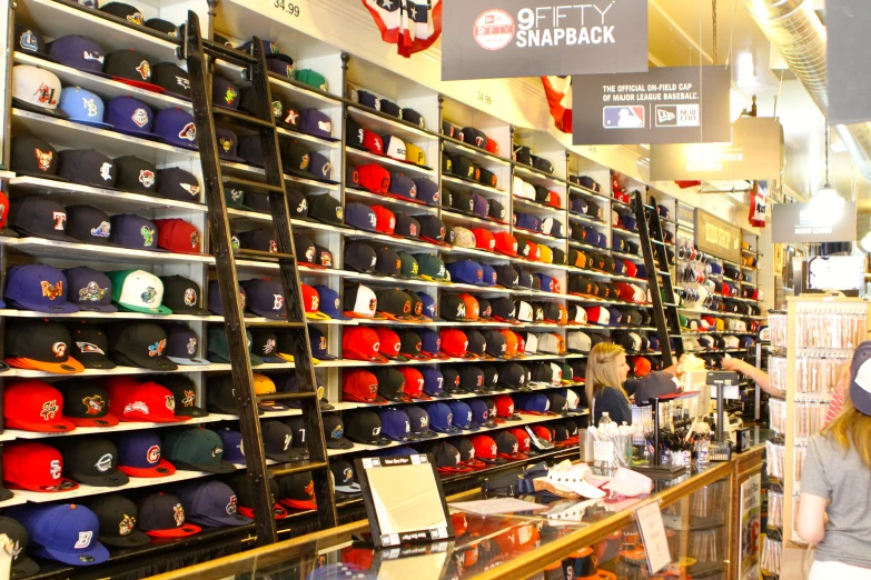 a store filled with lots of hats on display