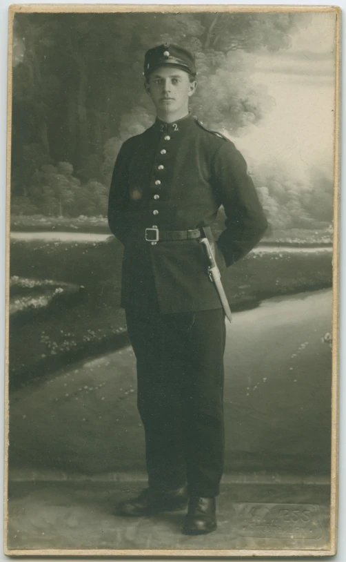 a portrait of a man in military dress clothes and an officer's hat