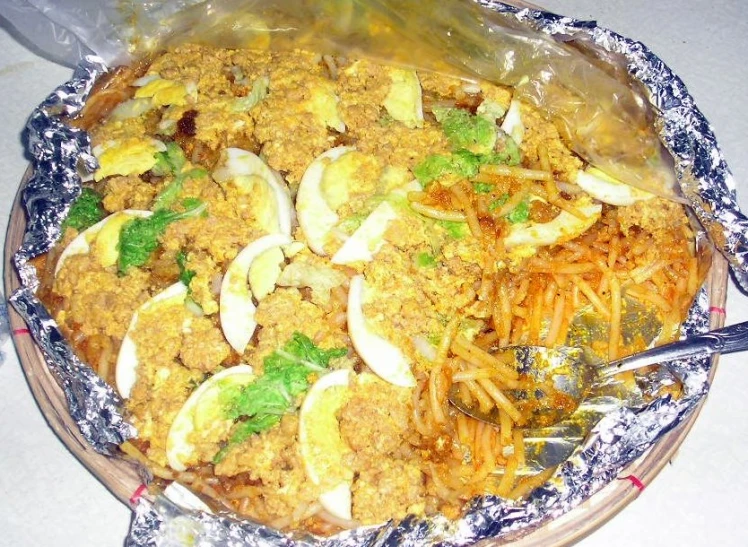 a plate full of some food sitting on a table