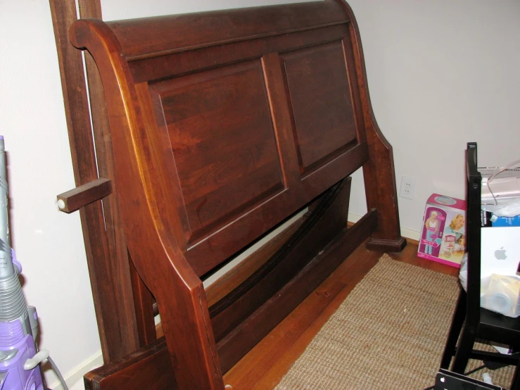 a wooden head board in a child's room