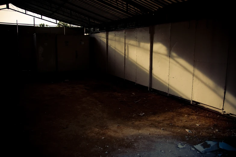 a room that has walls covered with boards and a wall mounted on one side