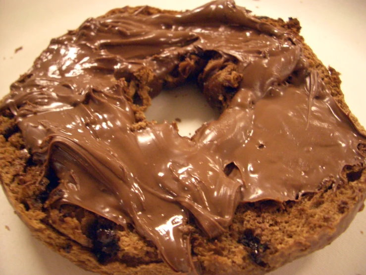 a chocolate covered pastry on top of a table