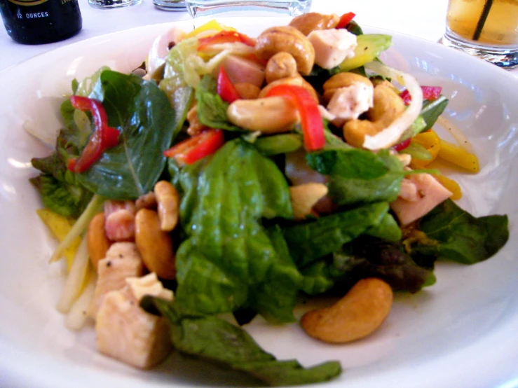 a salad of some sort on top of a white plate