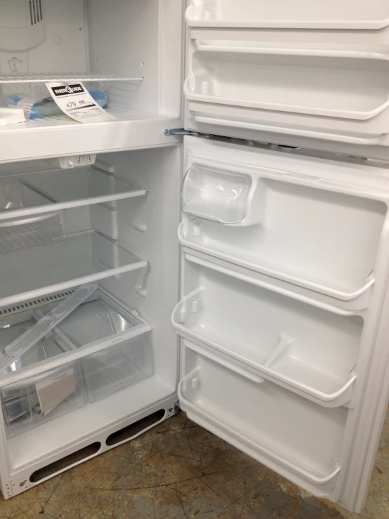 an open refrigerator with its doors wide open