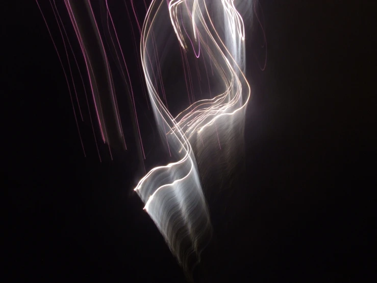 light painting of long exposure po of person on cellphone