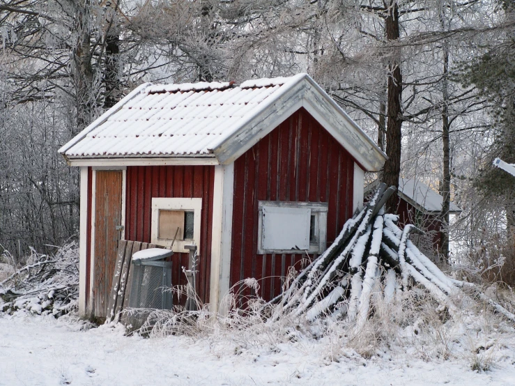 the house with the roof has been broken in an ice storm