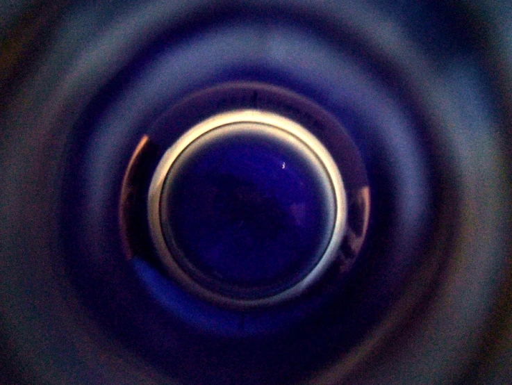 blurry circular pograph of a camera lens