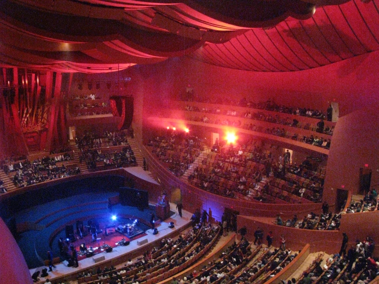 the auditorium at an opera where an audience is seated