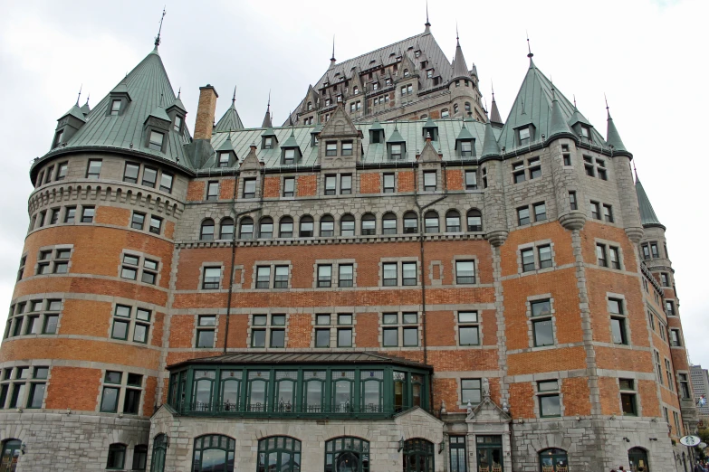 a castle type building with a massive clock tower