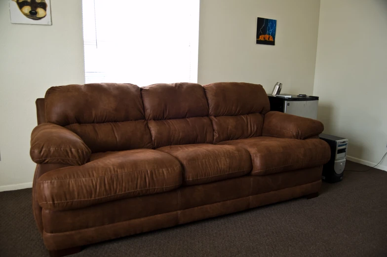 a large couch in a small room