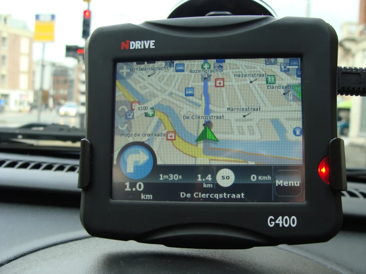 the gps of a car with a black backlight and red lights