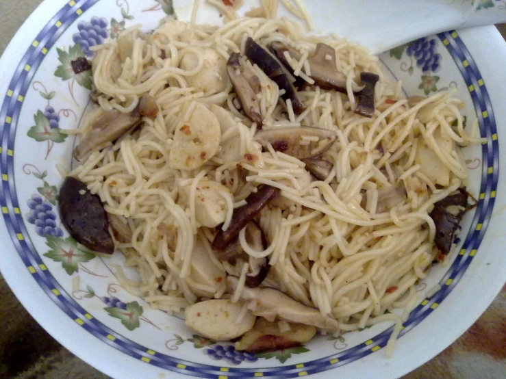 the bowl is filled with a variety of different types of food