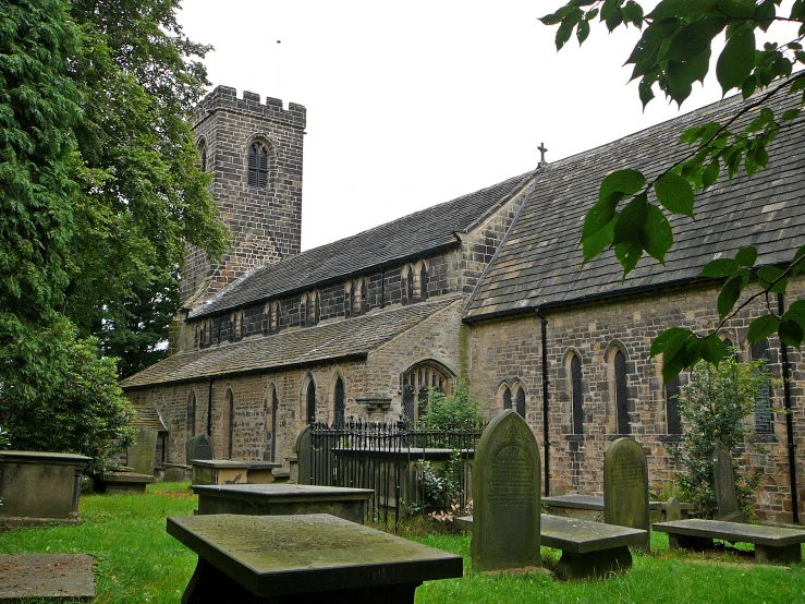 a church and graveyard sit next to each other