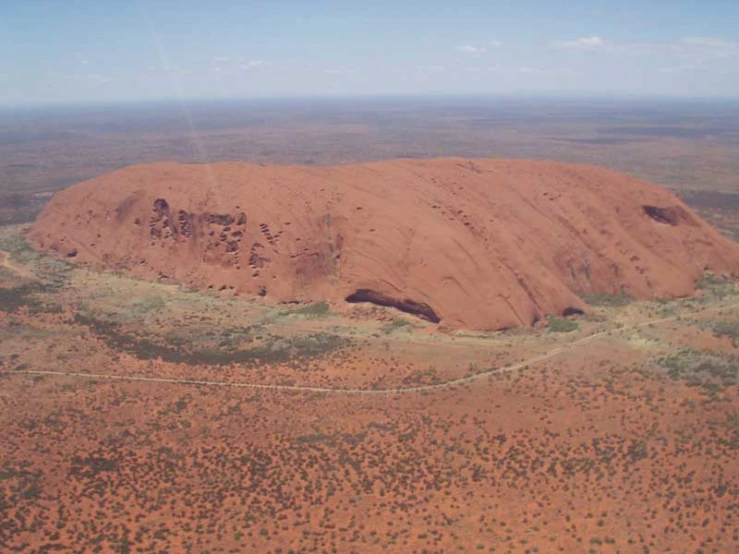 a mountain that is sitting in the middle of nowhere