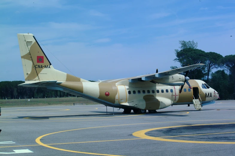 a large airplane is parked on a runway