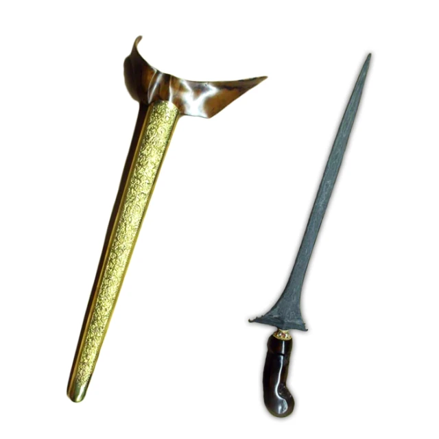 a gold colored dagger and a wooden handled dagger