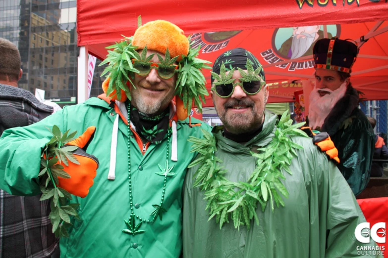 two men dressed in costumes at an event