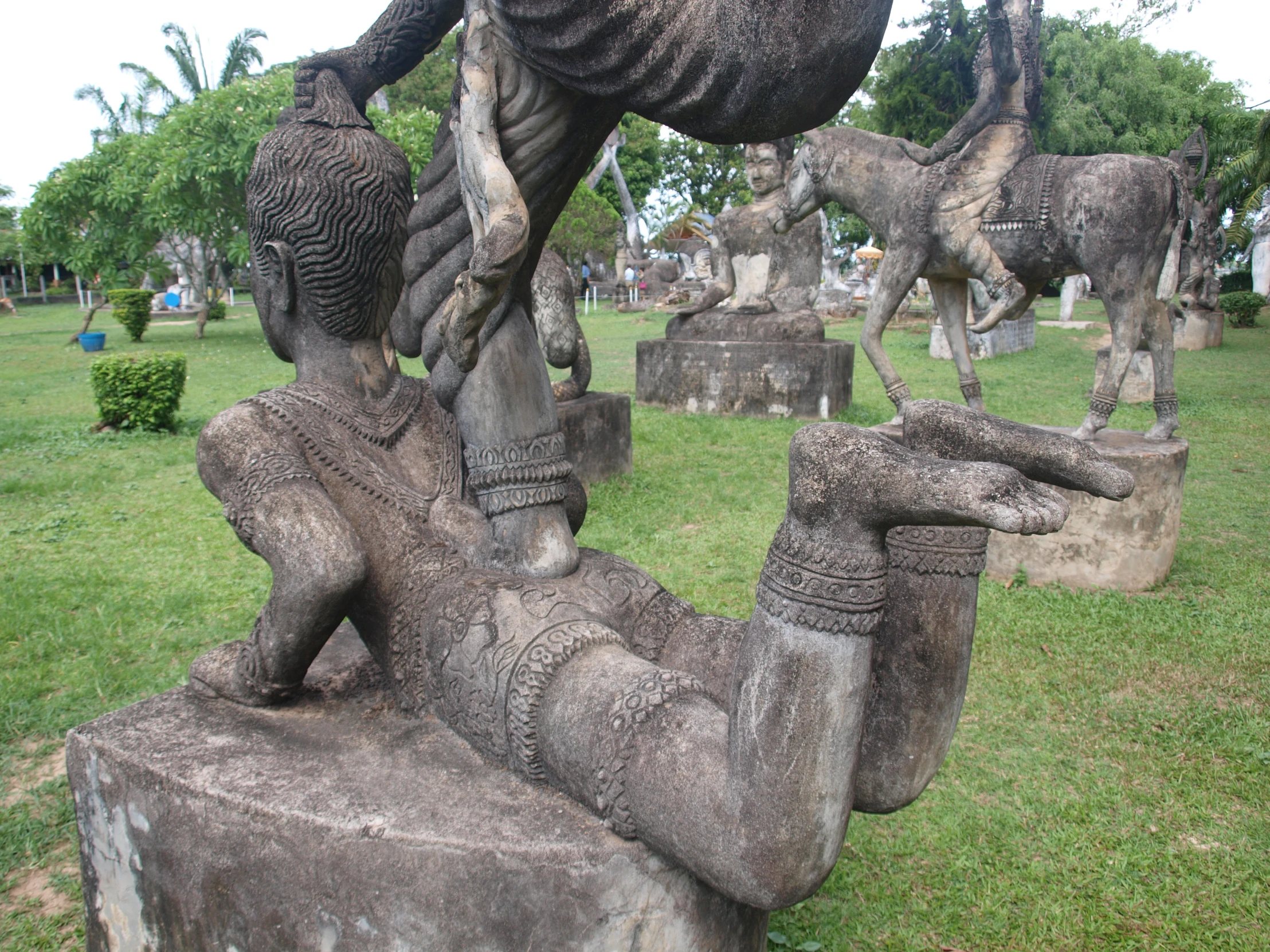 this is a sculpture of people that are lying down