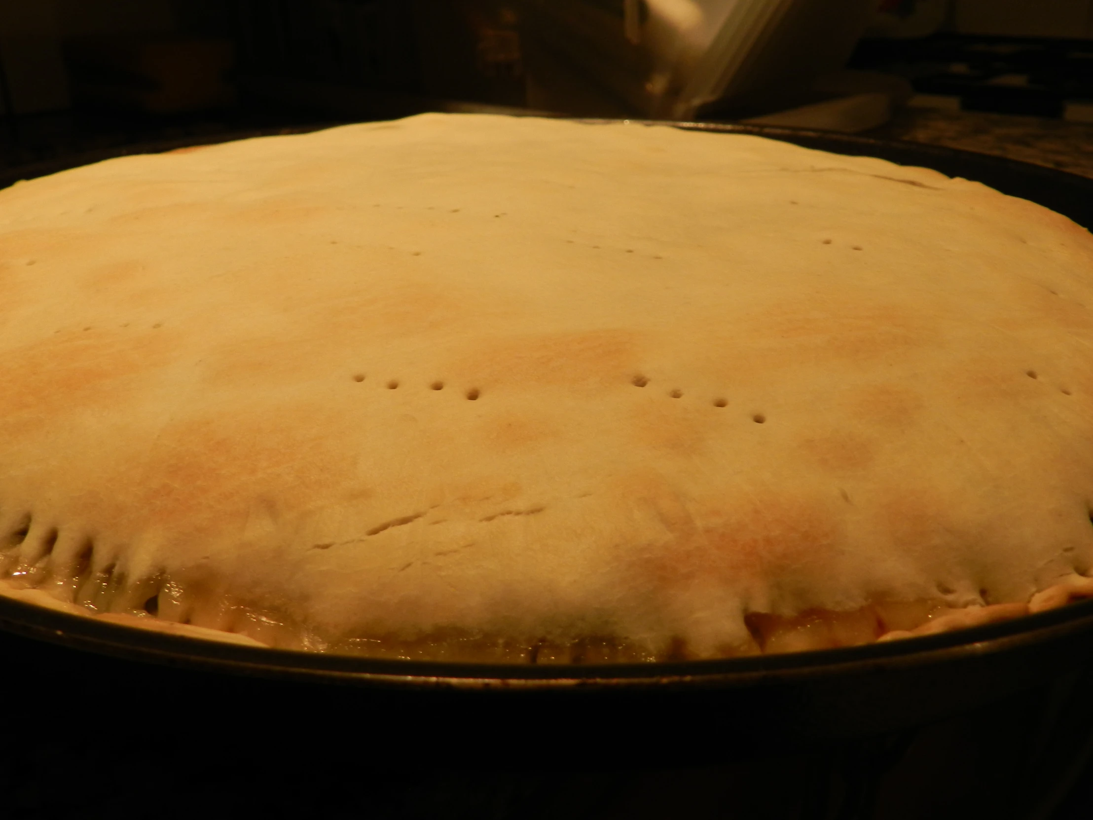 a pie crust is sitting in an empty pan