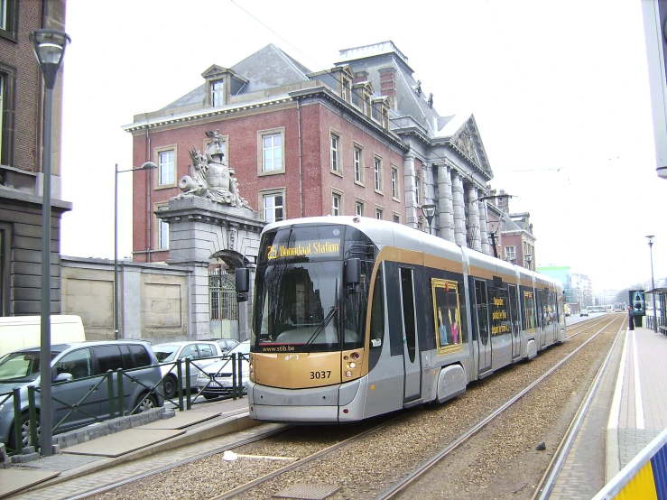 a commuter train moving through an urban setting