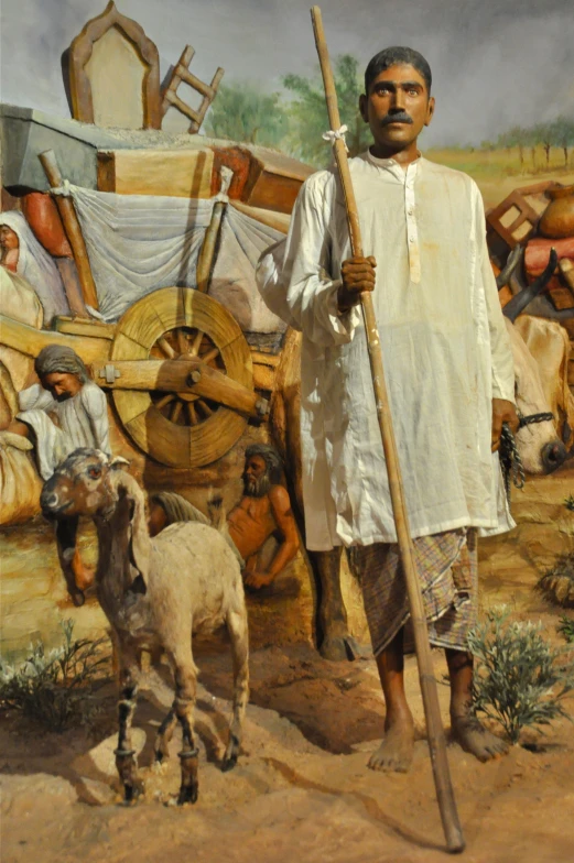 an old painting of a man in native garb and with his sheep