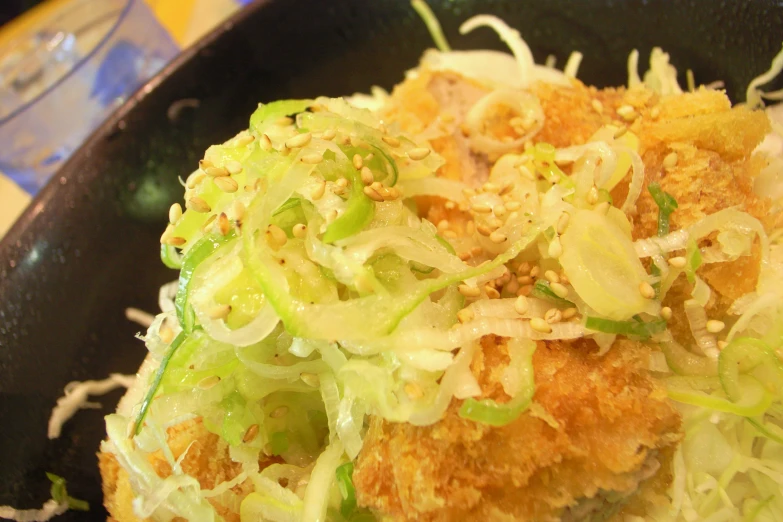 this is a fried food item with cabbage on the side