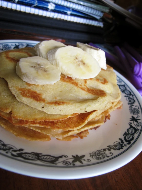 banana slices are stacked up on a plate