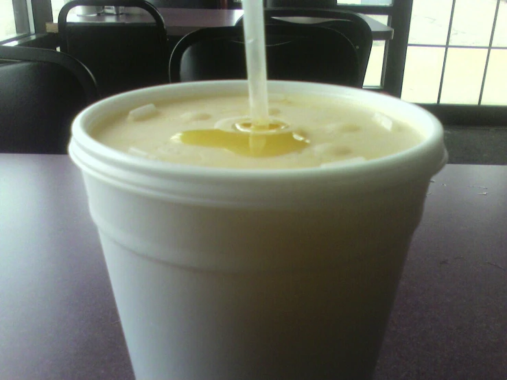 a close up of a cup on a table