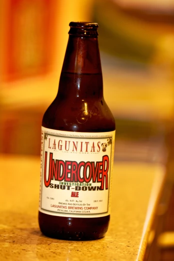 a brown bottle with the label lagunita's undercover beer