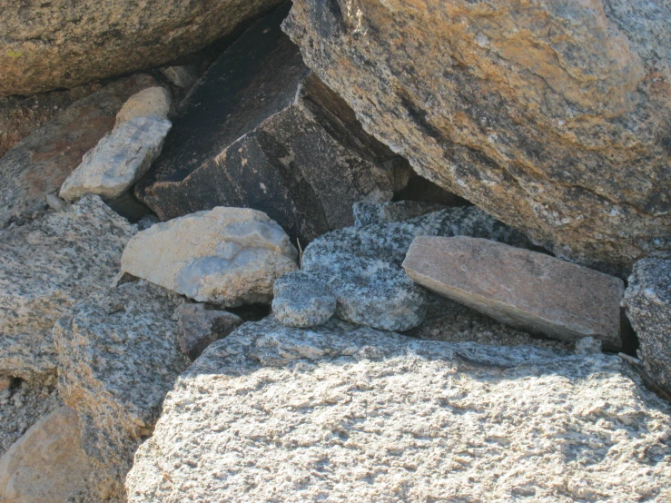 some rocks and boulders are stacked together