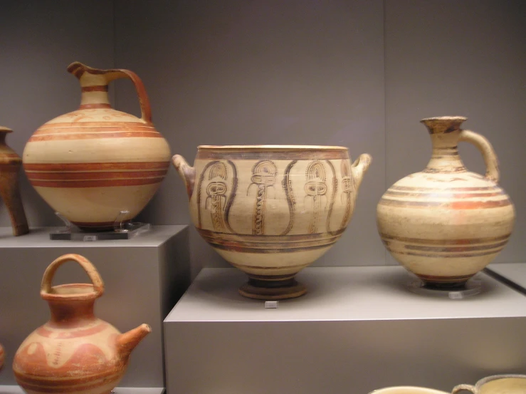 ancient greek vases on display at an exhibition