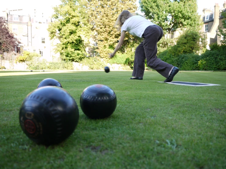 a person about to hit some balls at the field