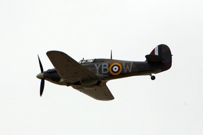 a close up view of an airplane flying in the sky