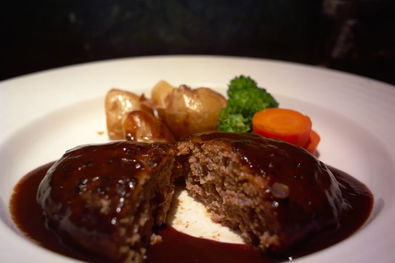 a fancy, chocolate dessert, with steamed vegetables