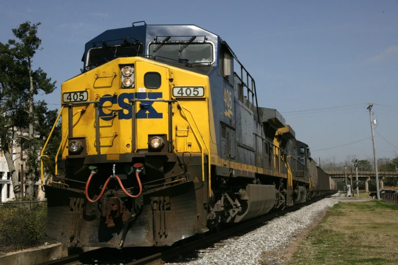 an old train engine traveling down the tracks