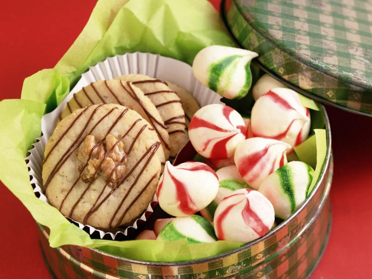 a couple of small tins filled with lots of different kinds of cookies